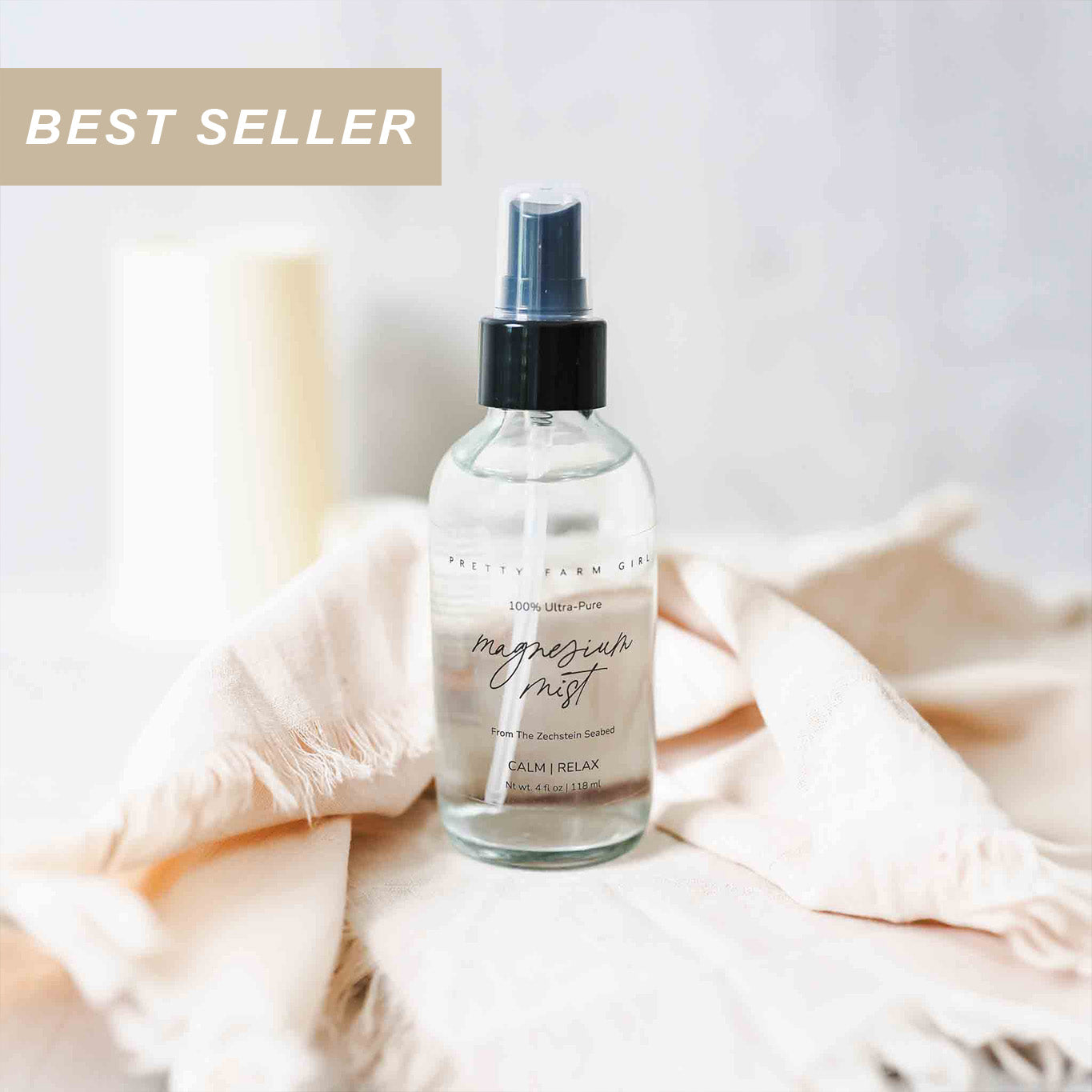 Bottle of magnesium mist on a soft fabric background with 'Best Seller' label.
