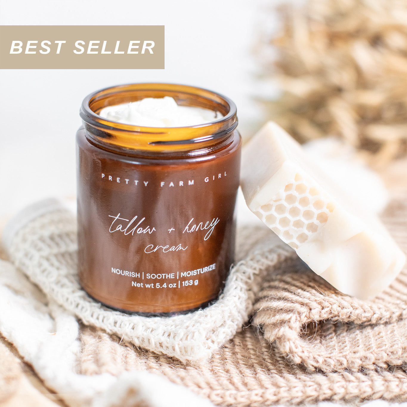 Jar of 'tallow + honey cream' and Milk + Honey Soap by Pretty Farm Girl on a textured surface with 'Best Seller' label.