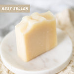 Bar of soap on a white plate with 'BEST SELLER' text above it