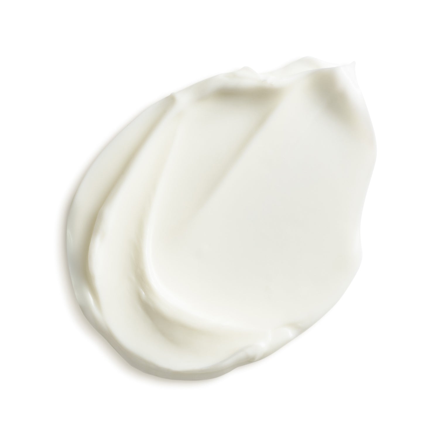 Two swatches of white cream on a white background