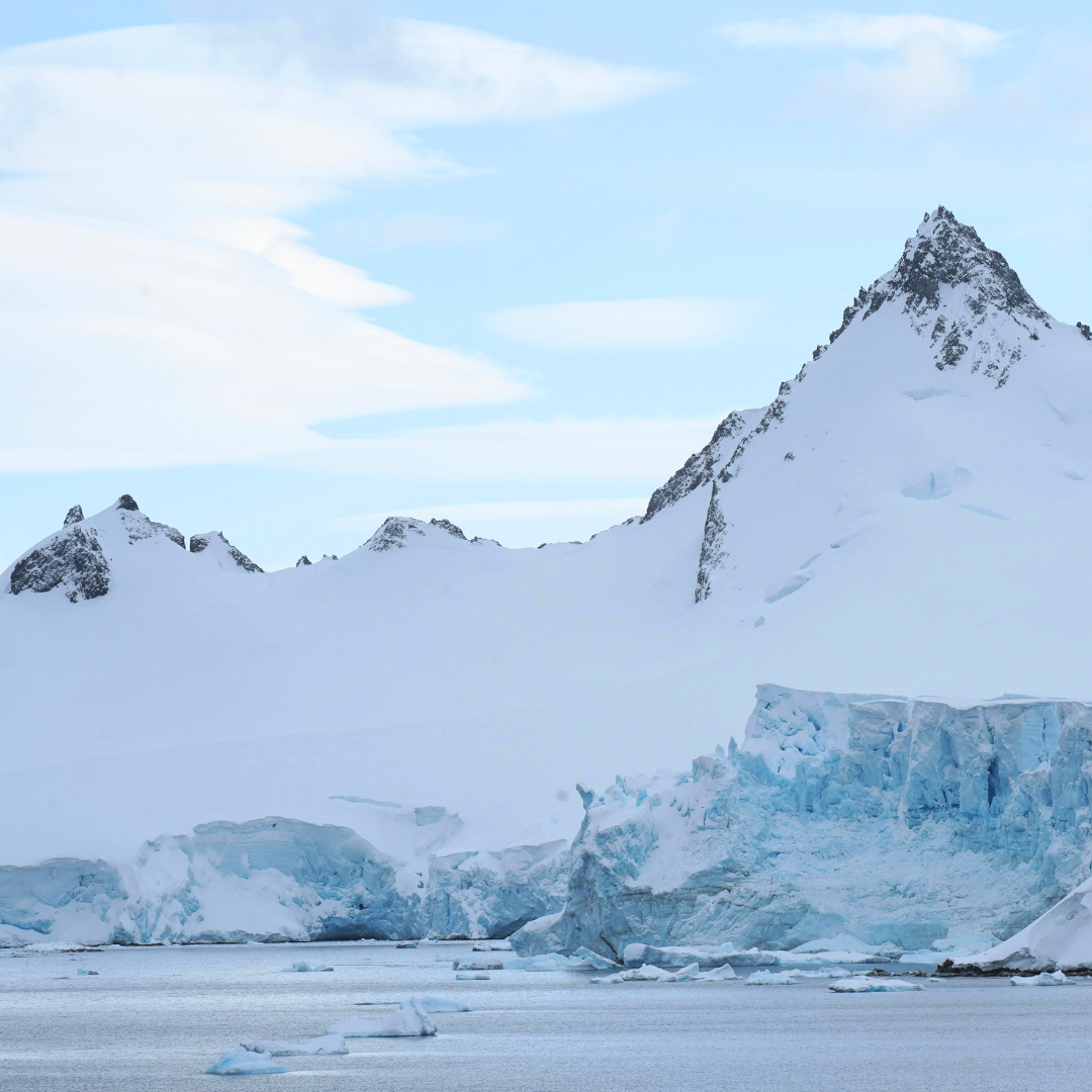 Snowy Zechstein mountain landscape with icebergs and a clear sky