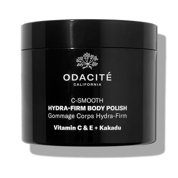 Black jar of Odacite C-Smooth Hydra-Firm Body Polish on a white background