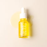 Plum Glow Multipurpose Face Serum bottle on a soft neutral background with golden plum oil texture