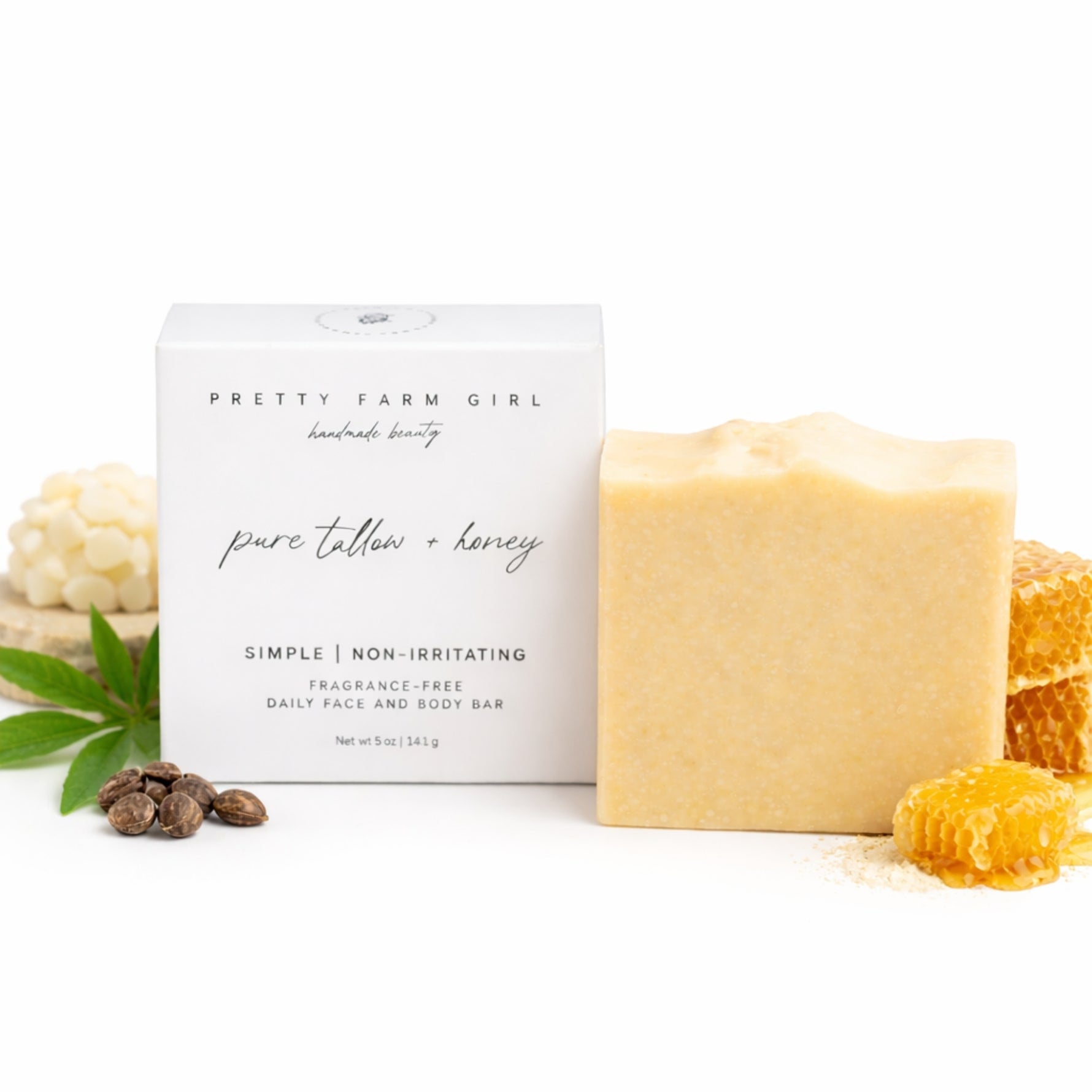 Bar of soap with packaging labeled 'Pretty Farm Girl' on a white background with honeycomb and honeycomb pieces.