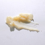 Close-up of Pretty Farm Girl Tallow + Honey Tallow Body Balm texture on a neutral background.