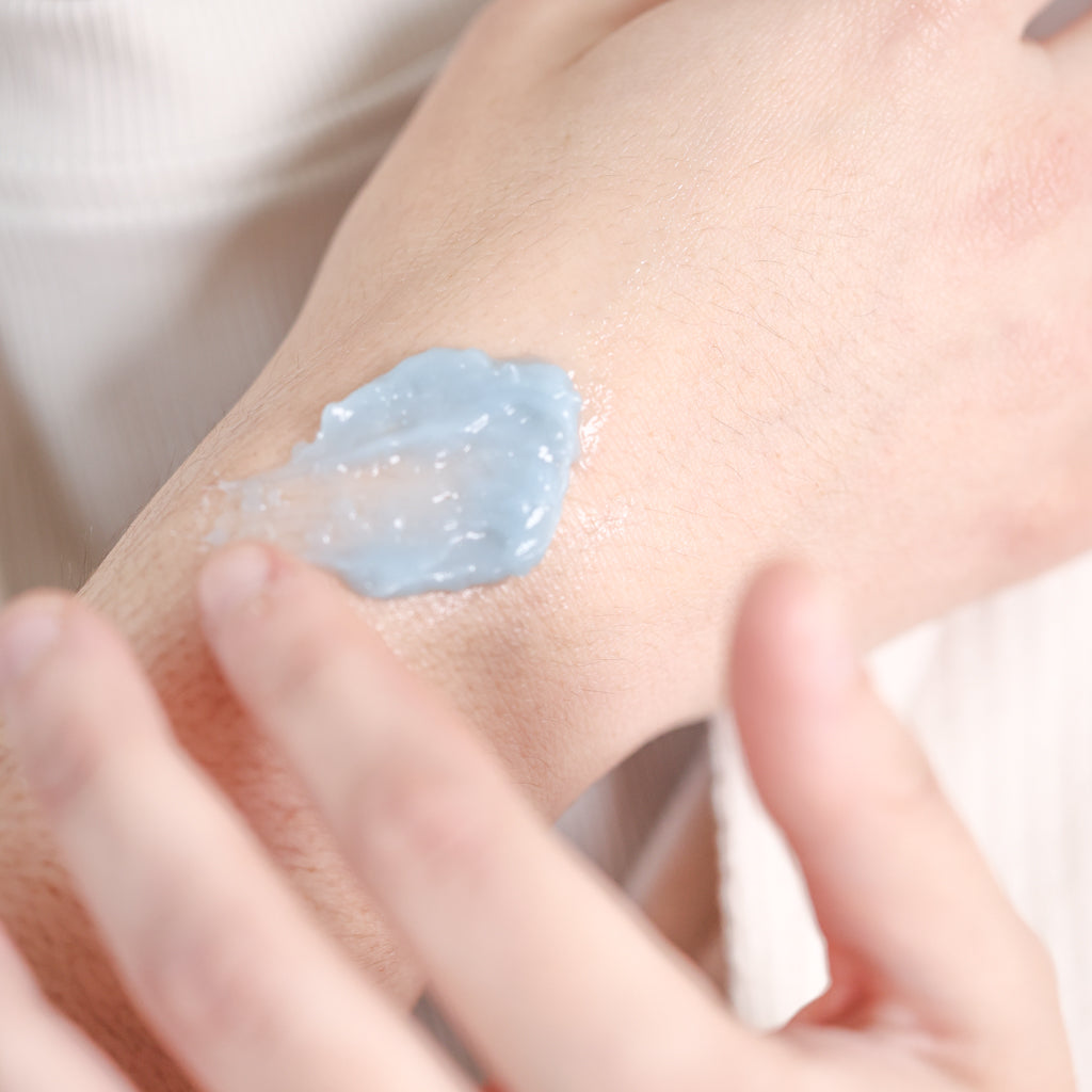 Pretty Farm Girl Blue Beauty Balm texture shown on the back of a hand.