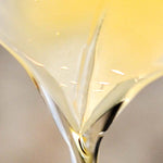 Close-up of pure cold-pressed castor oil texture – hexane-free organic castor oil by Pretty Farm Girl