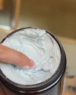 How-to-use video showing Pretty Farm Girl Tallow + Tansy Body Butter being applied and massaged into a woman’s arm