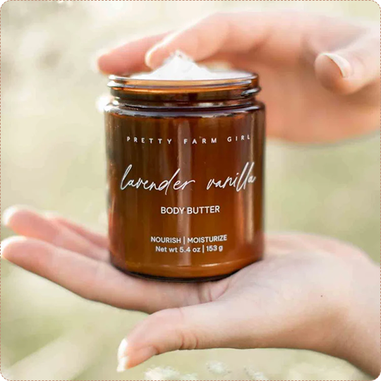 Lavender Vanilla Bean Tallow Body Butter jar held in two hands